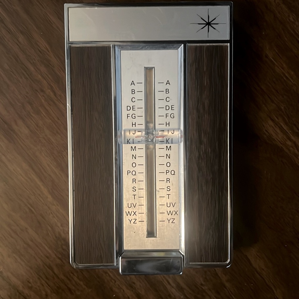 Vintage Mid Century Modern Lion Flip Address Book with Atomic Starburst.